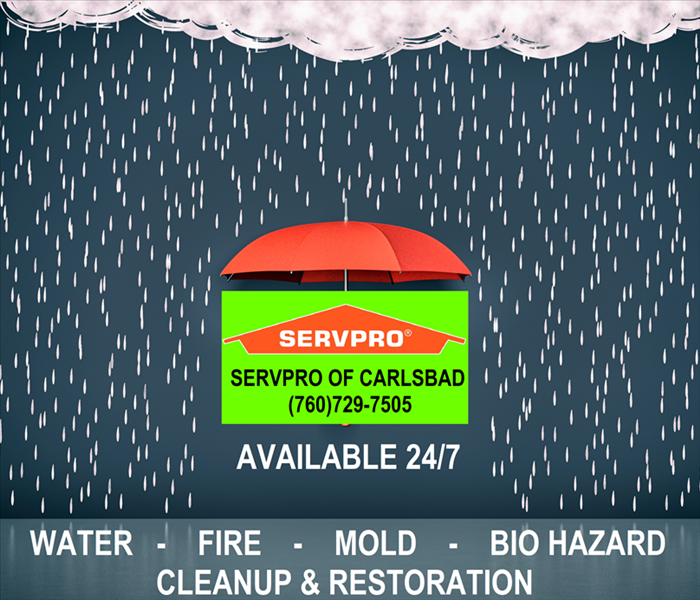 umbrella with rain covering SERVPRO of Carlsbad information.